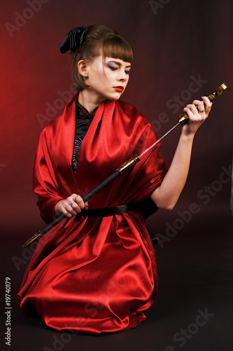 Принти на полотні girl in red kimono with katana