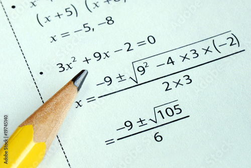 Obraz na płótnie Doing some grade school Math with a pencil