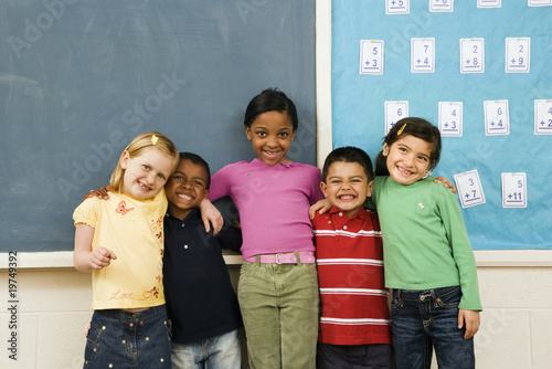 Students Standing in Classroom.