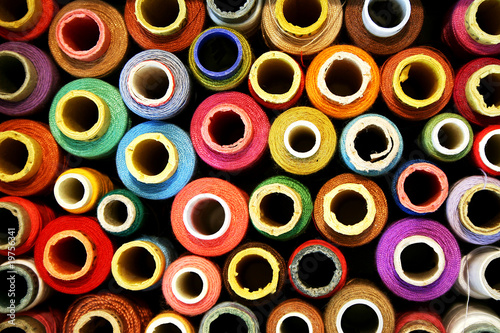 reels of color threads on black © shooarts