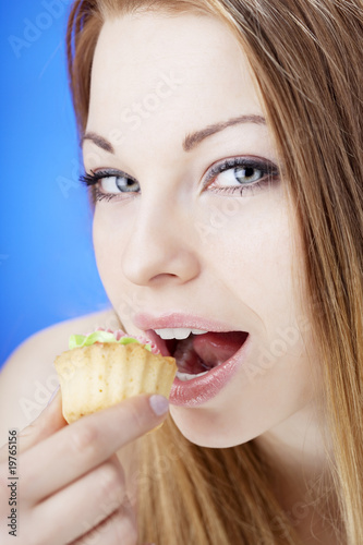 Beautiful girl who eats cakes