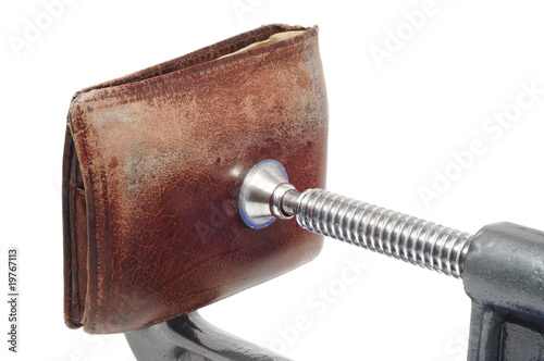 Obraz na plátně Old Worn Wallet Being Squeezed in a C Clamp