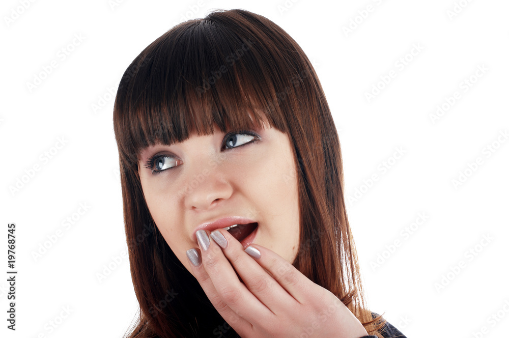 The cheerful charming brunette female in dark blue sweater The cheerful charming brunette female in dark blue sweater