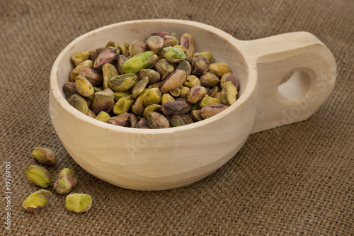 scoop of raw shelled pistachio nuts