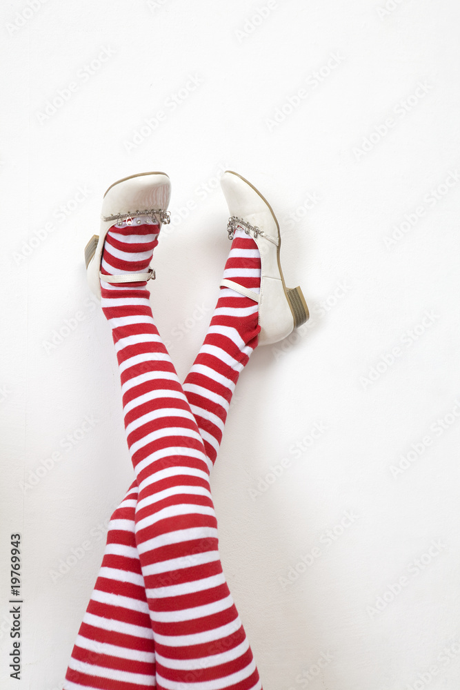 head over heels. female legs in stripy stockings; head over heels. female legs in stripy stockings;
