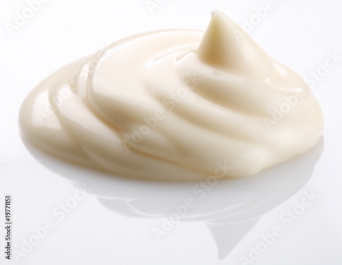 handful of mayonnaise on white background