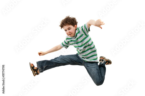 Boy jumping isolated on white background