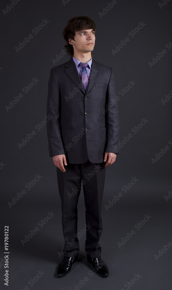 studio portrait of a serious businessman in black studio portrait of a serious businessman in black
