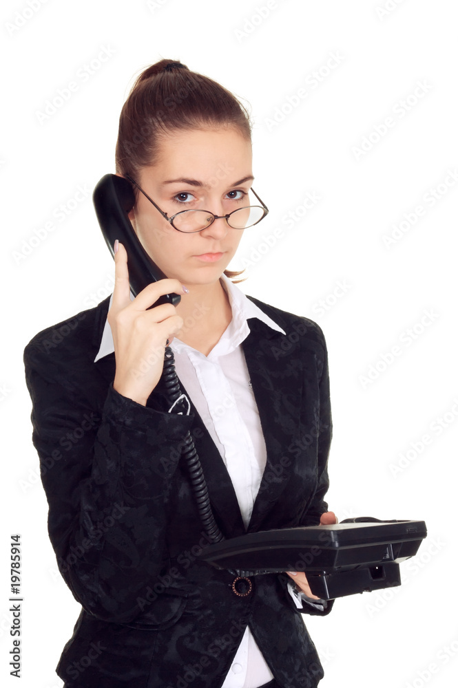 Young business woman calling by phone isolated on white Young business woman calling by phone isolated on white