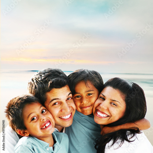 Four Family Face Together at the Beach Portrait
