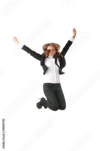 A business woman jumping with hands in the air