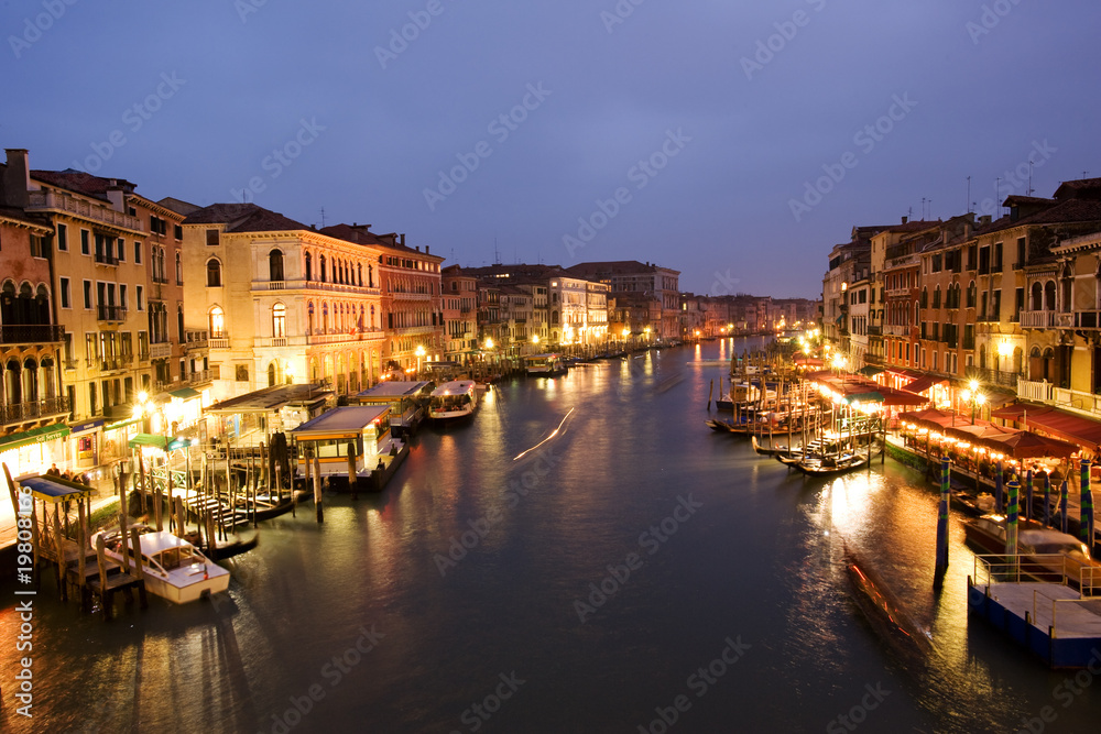 Night life along Venetian Grand Canal by Rialto bridge
