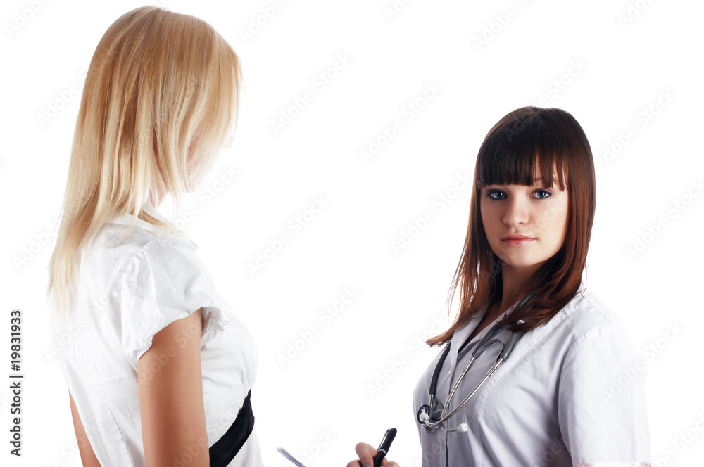 The young charming staff nurse with patient The young charming staff nurse with patient