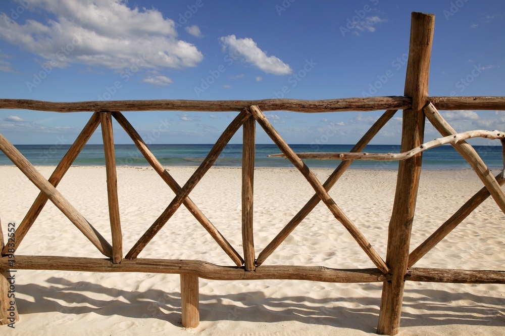 Caribbean wooden tropical fence wall on the beach Caribbean wooden tropical fence wall on the beach
