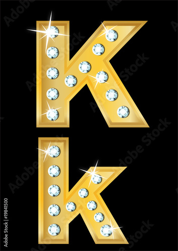 golden letter "K" encrusted diamonds