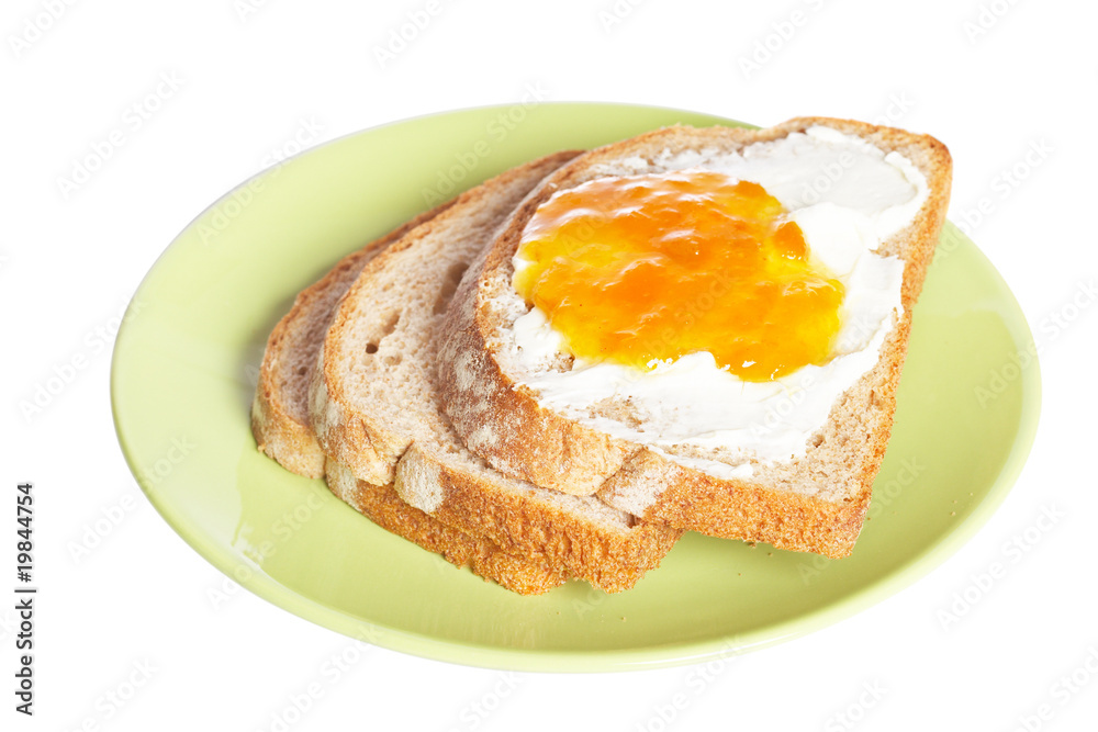 Toast with butter and peach jam Toast with butter and peach jam