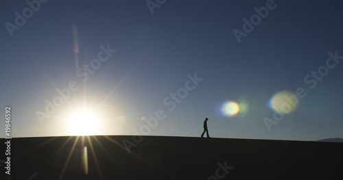 Man Walking in Desert