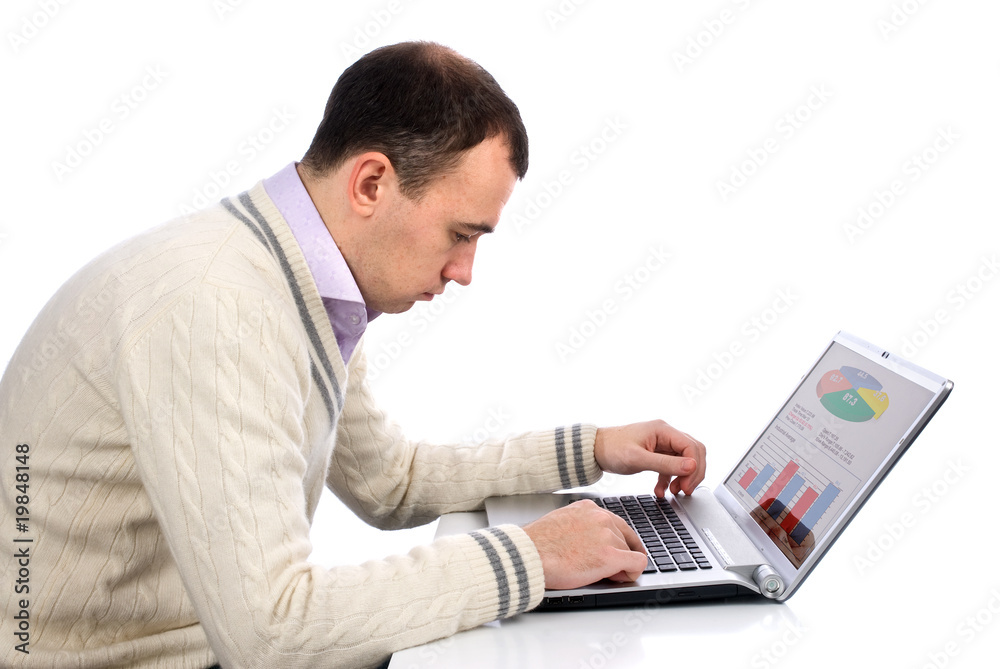 Young businessman using laptop computer Young businessman using laptop computer