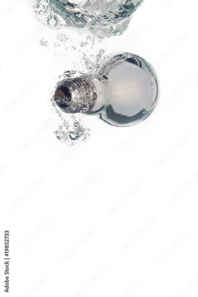 A lightbulb falling into clear water A lightbulb falling into clear water