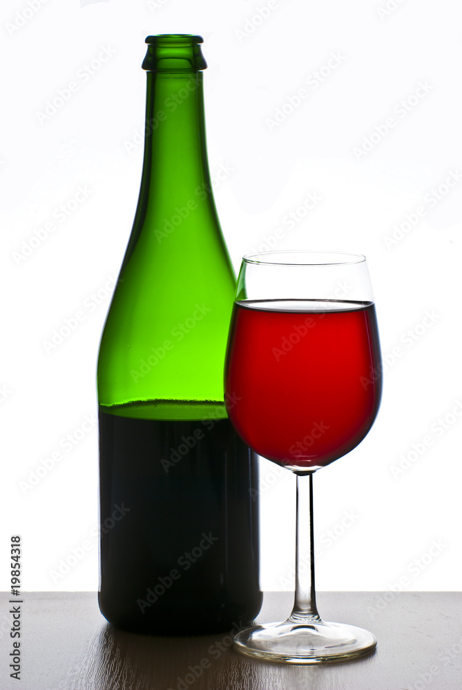 Bottle and glass of red wine isolated on white background Bottle and glass of red wine isolated on white background