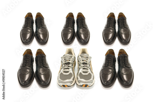 sport shoes and business shoes on white background