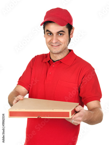 Boy with red uniform delivering a pizza box photo