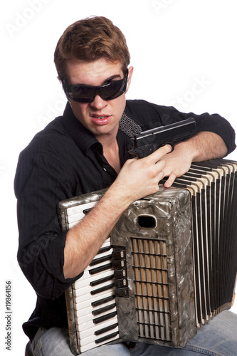 Male with accordion and gun
