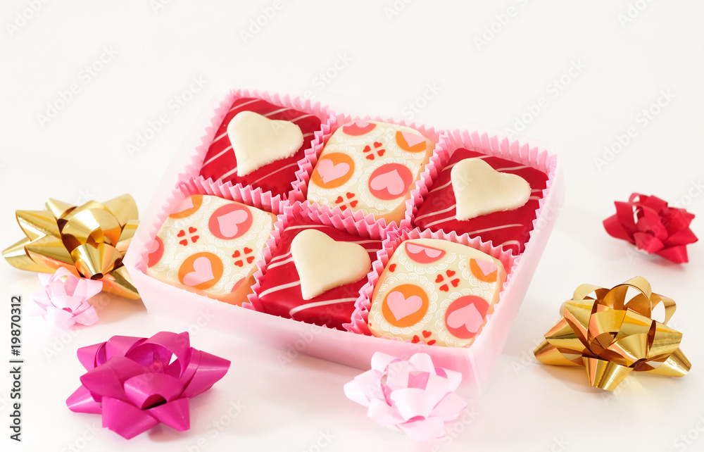 Composition for Valentine's day with small heart chocolates Composition for Valentine's day with small heart chocolates
