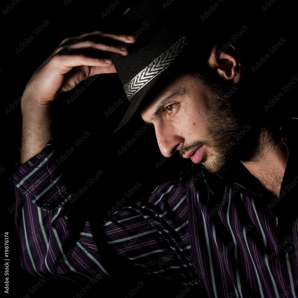 ragazzo con cappello e camicia Stock Photo | Adobe Stock