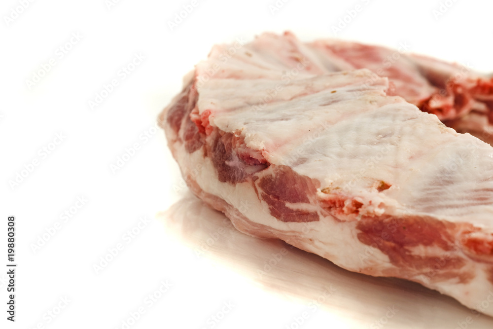 Pork ribs and meat isolated over white