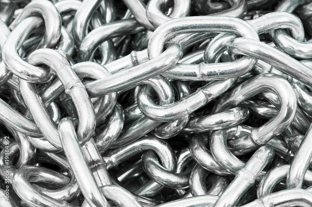 Long silver chain arranged as the background Long silver chain arranged as the background