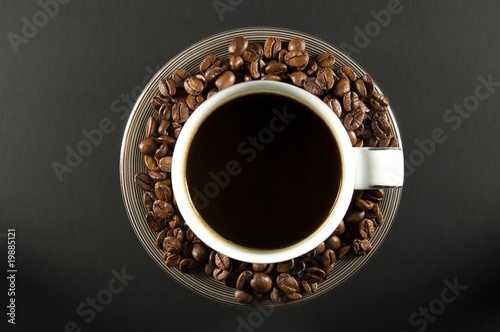 Biała filiżanka w kawie © aigielsk