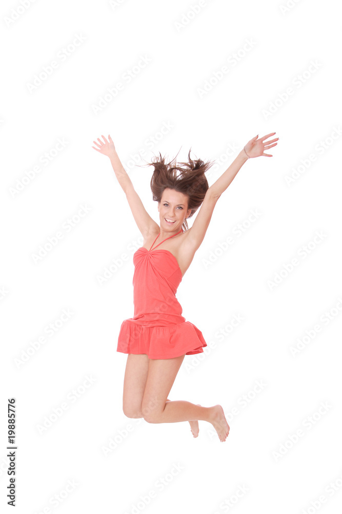 Beautiful young woman jumping