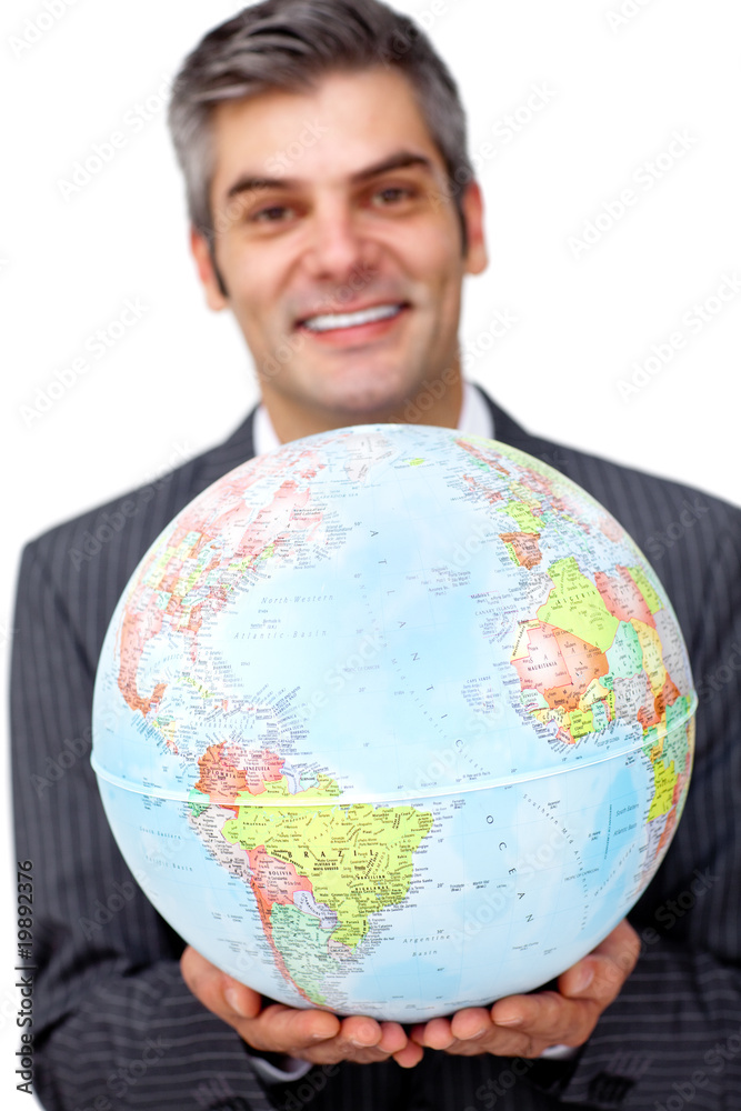 Mature businessman holding a terrestrial globe Mature businessman holding a terrestrial globe