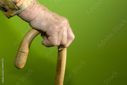 hand of old woman with stick © Renáta Sedmáková
