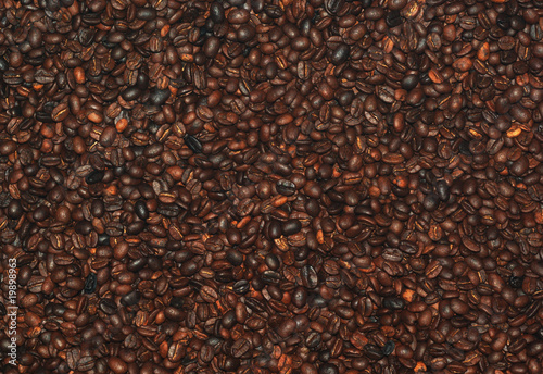 Overview of many freshly roasted coffee beans