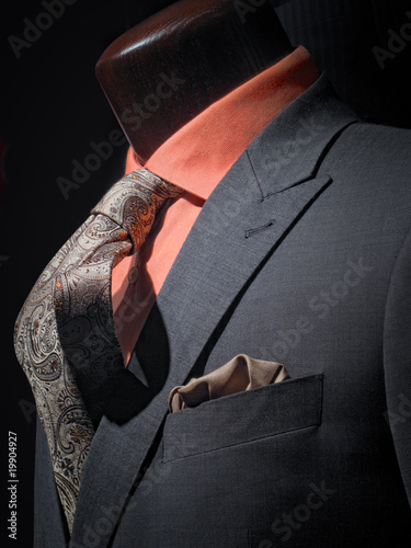 Grey jacket with orange shirt, tie and handkerchief (vertical)