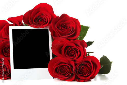 Fototapeta Naklejka Na Ścianę i Meble -  Bouquet of roses with empty photo
