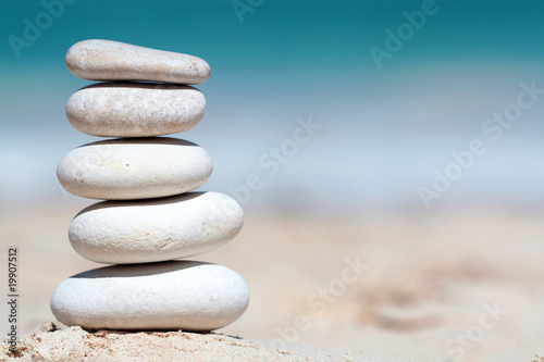 Stack of stones arrenged as tower on the beach