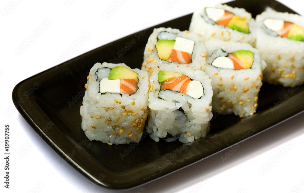 Six california rolls on a plate isolated on white Six california rolls on a plate isolated on white