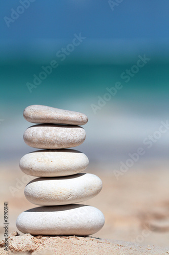 Tower of stones on the beach used for relax