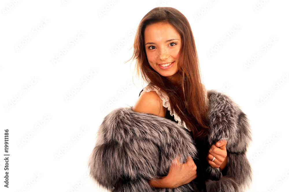 Beautiful young woman in fur coat Beautiful young woman in fur coat
