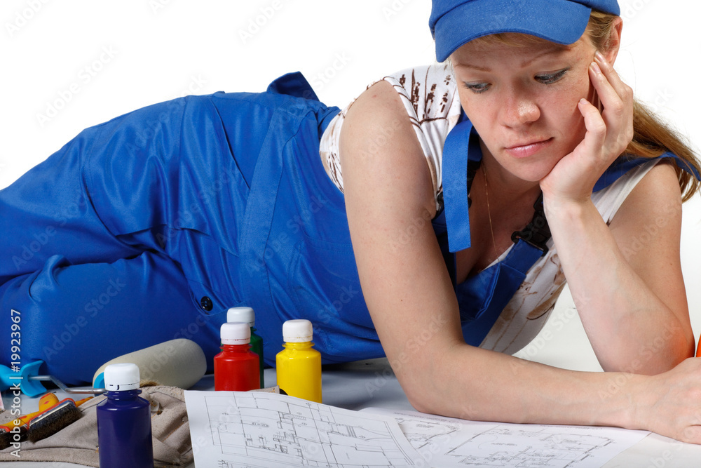 The pregnant woman in working overalls The pregnant woman in working overalls