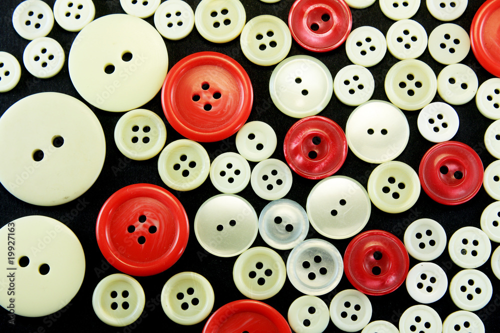 Texture of Sewing buttons isolated on black Texture of Sewing buttons isolated on black