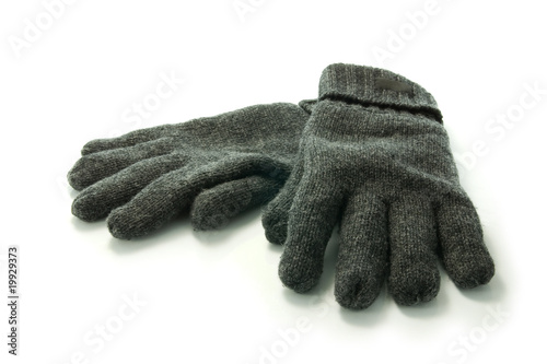 Pair of wool gloves on white background
