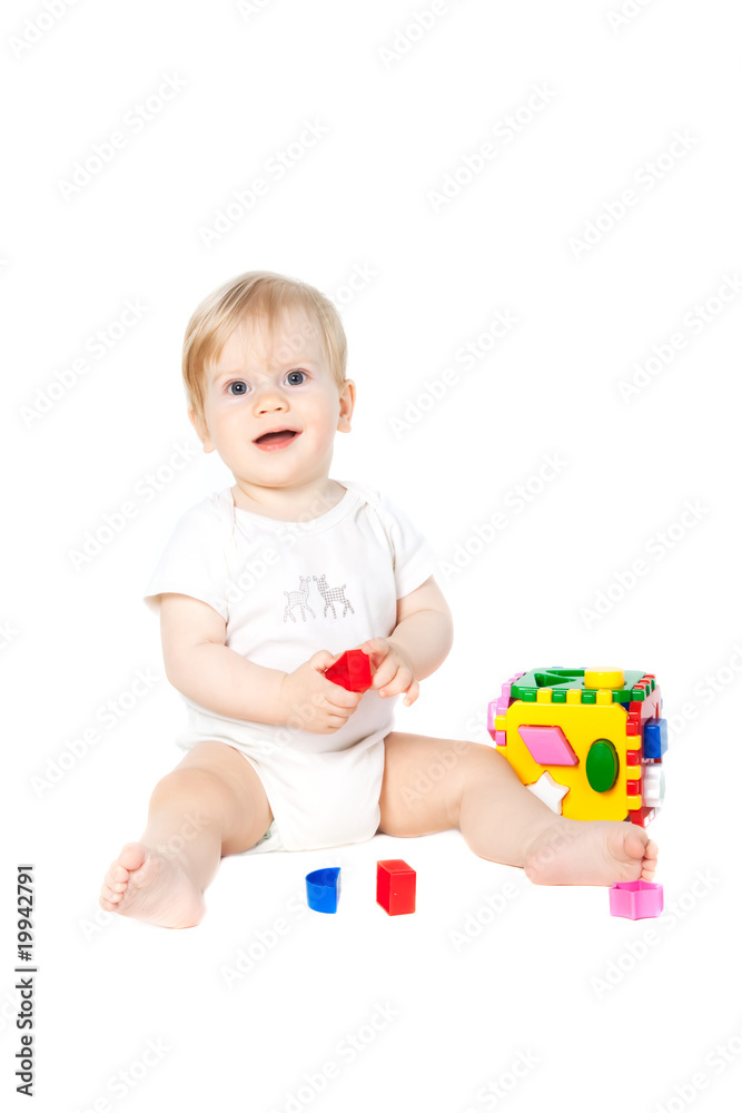Baby played with a toy for the development of logical thinking Baby played with a toy for the development of logical thinking