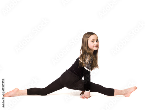 Young girl doing gymnastics