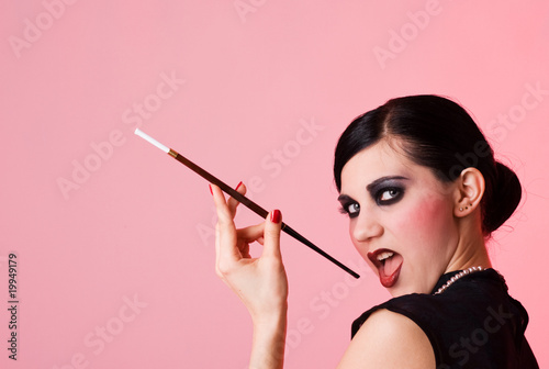 Flirting girl with cigarette