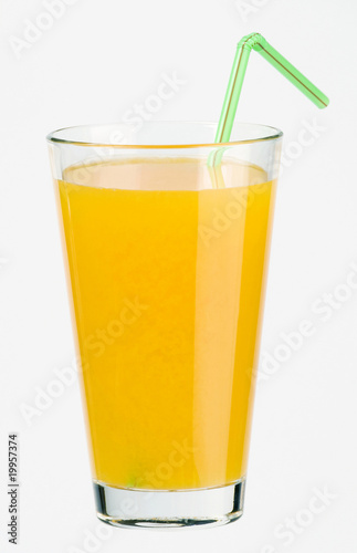Glass of juice with a straw