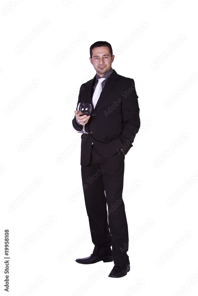 Businessman celebrating with a glass of drink Businessman celebrating with a glass of drink